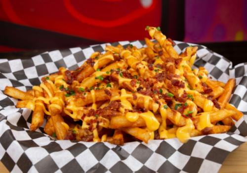 Loaded fries with cheese and bacon.